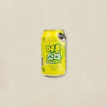 Yellow can of Sparkling Melon beverage with Korean text, centered on a light beige background.