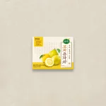 Korean citron tea box with lemons on a beige background, label reads 모과유자차 and 100% domestic ingredients (Sampyo/순작 logo).