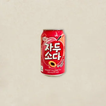 Red can of plum soda with Korean text, centered on a light beige background; includes small 'Sparkling Plum' label and a graphic plum image.