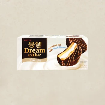 Lotte Dream Cake packaging showing cream cake, chocolate-covered roll image on the right and 'Dream Cake' label on the left