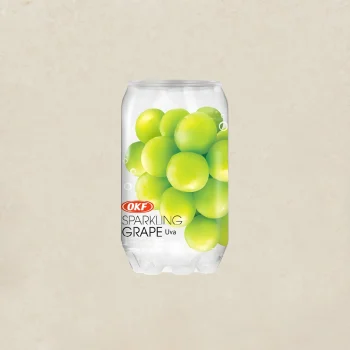 Aluminum can of OKF Sparkling Grape drink with a label showing clusters of green grapes on a beige background