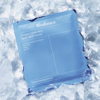 Blue Biodance Hydro Cera-Nol Real Deep Mask sachet nestled in crushed ice surface