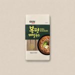 Package of Assi Soba Noodles in a white bag with a dark green label, featuring noodles in a bowl on the right and 'Product of Korea' at the bottom.