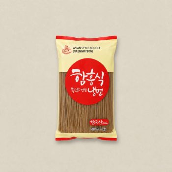 Bag of Asian-style noodles with a red circular emblem and a window showing dry noodles beneath a beige body and red trim.