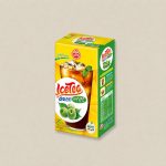 Carton of Ice Tea with a glass of iced tea and green plums on the label, yellow and green packaging with Korean text
