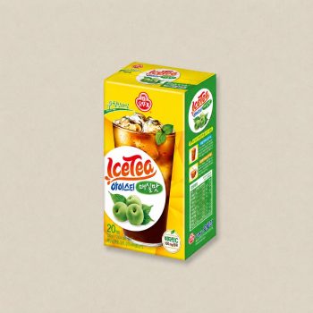 Carton of Ice Tea with a glass of iced tea and green plums on the label, yellow and green packaging with Korean text