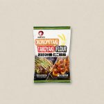 Bag of Okonomiyaki/Takoyaki flour mix with Japanese text and food images on the front, centered on a neutral background