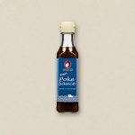 Bottle of vegan poke sauce with blue label reading 'Vegan Poke Sauce' and Otafuku logo, 8.1 oz (230 g) net weight, centered on a light beige background