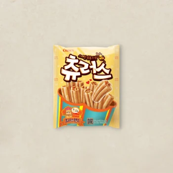 Bright yellow bag of Korean snack sticks; front shows crispy rolled sticks on a beige background.