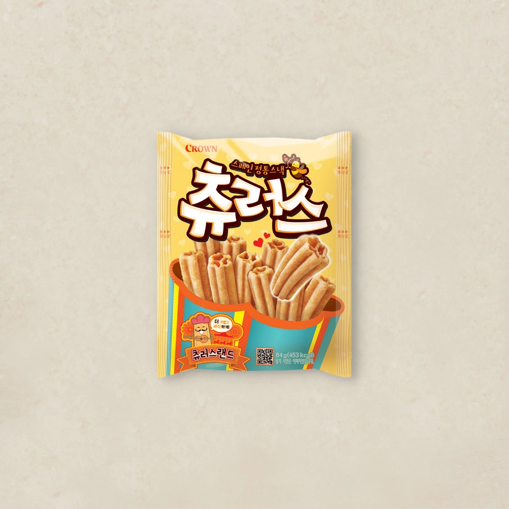 츄러스 Bright yellow bag of Korean snack sticks; front shows crispy rolled sticks on a beige background.