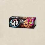 Box of Lotte Real Chocolate Cookies featuring a dark package with large blue Korean logo and chocolate chunks on the front.