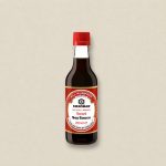 Kikkoman all-purpose Sweet Soy Sauce bottle with red cap on a neutral background (250 ml).