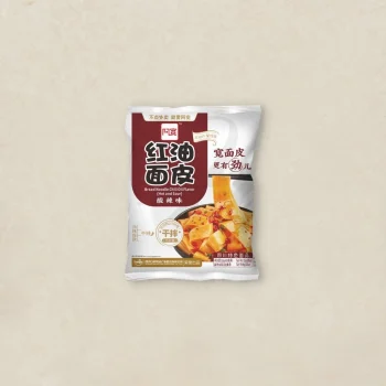 Front of a snack bag labeled Broad Noodle Chili Oil Flavor with an image of noodles in a bowl on the front.