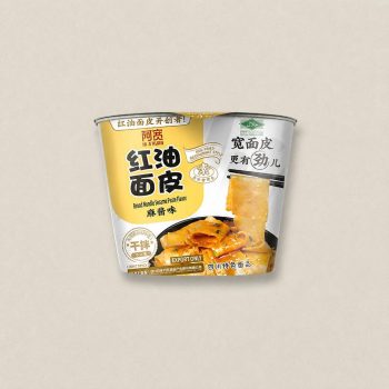 Instant noodle cup with sesame flavor packaging, showing Chinese text and a noodle image on the front.