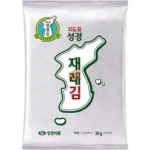 Front of a white snack bag featuring a Korea-shaped outline with red Korean text 재배김 and small branding marks.