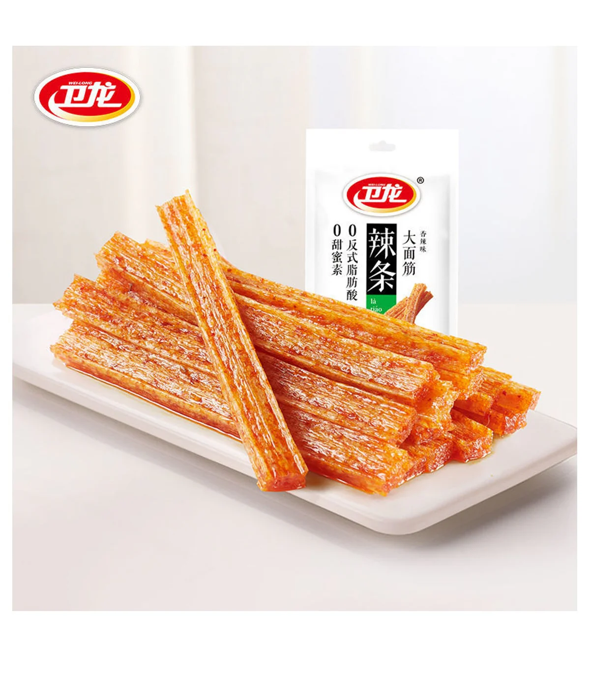 big-la-tiao-hotspicy-106g-weilong-snack-di-frumento-piccante-la-tiao_1200x Plate of orange, crispy snack sticks stacked on a white dish with a white pouch featuring a red-and-yellow logo in the background (snack product shot).