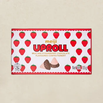 Meiji Uproll milk and strawberry chocolate confectionery packaging with red strawberry pattern on white background.