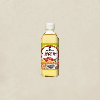 Bottle of Kikkoman sushi rice seasoning with label reading 'Seasoning for Sushi Rice' and images of sushi on the lower label.