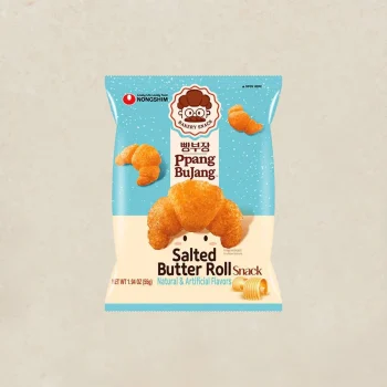 Front view of a blue bag labeled Salted Butter Roll Snack by Nongshim Bakery Snack, with a cute cartoon face and croissant-shaped bites imagery.