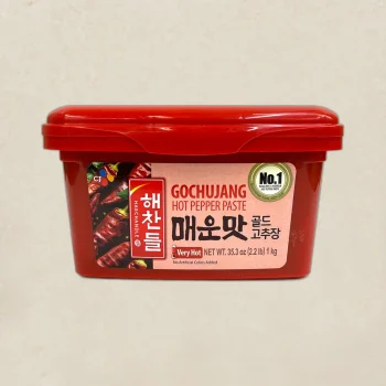 Red tub of Gochujang hot pepper paste with a pink label and 'Very Hot' indicator on the front.