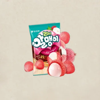 Bright fruit snack package with pink label and fresh raspberries around it on a light beige background.