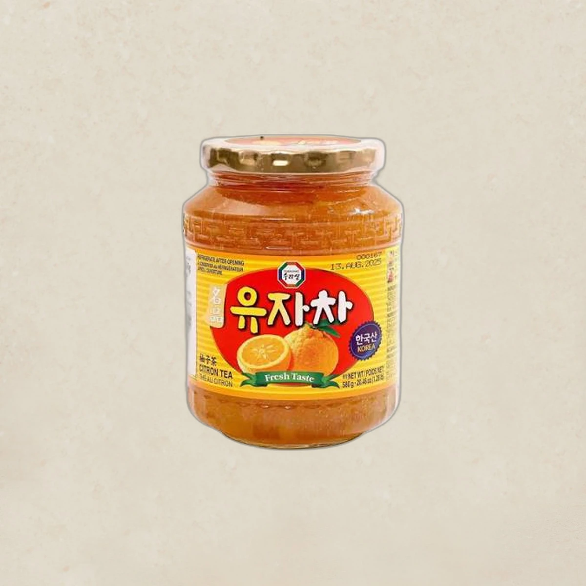 mall_ref1914_1787247154.webp Jar of Korean citron tea (yujacha) with a yellow label and citrus fruit illustrations on the label.