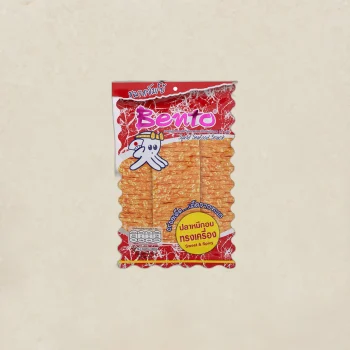 Front of a red Bento squid seafood snack package with a cartoon squid and a purple logo on a beige background, flavor Sweet & Spicy in a yellow circle.